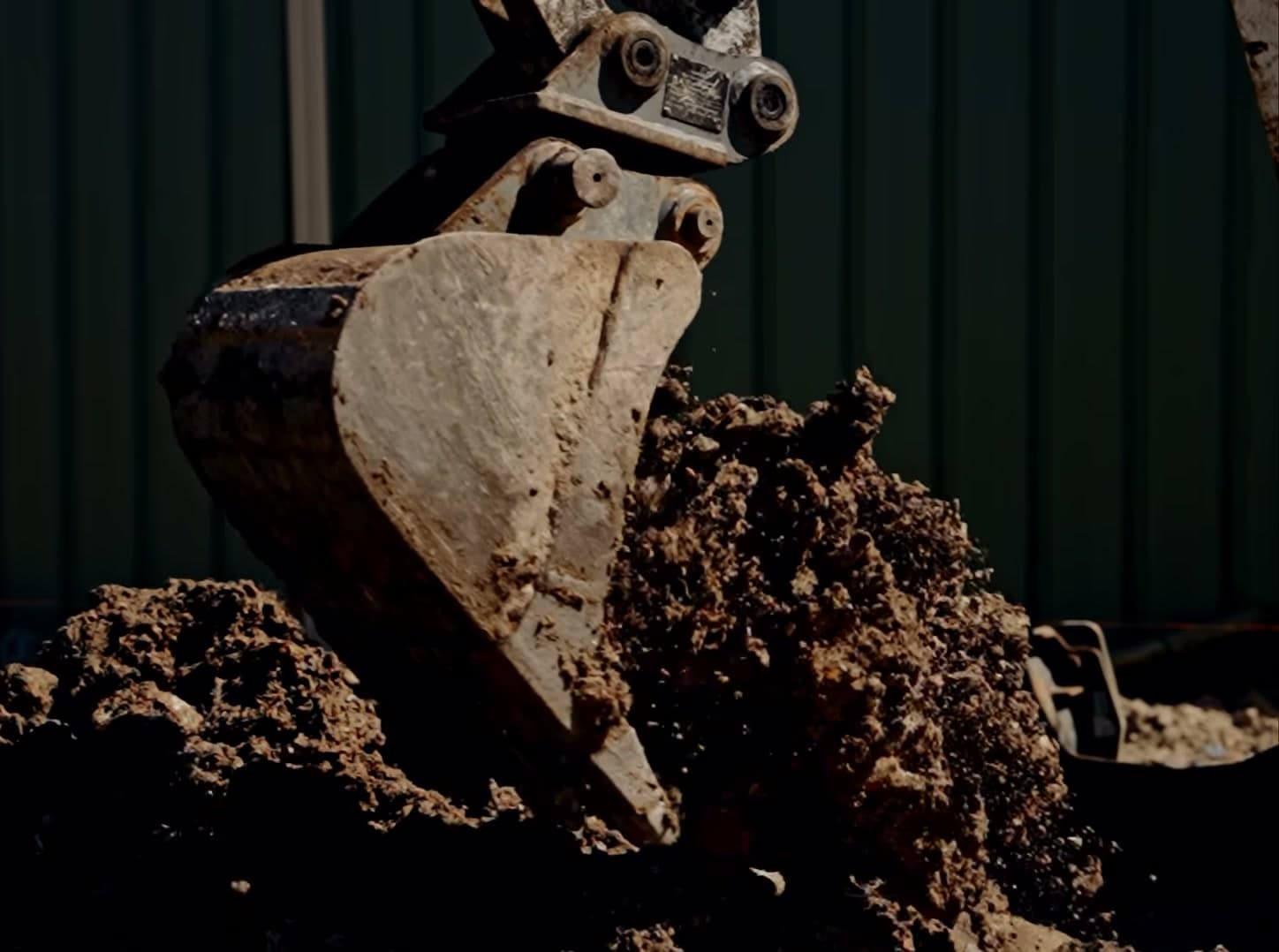 Zimco Plumbing excavator digging out a drain line