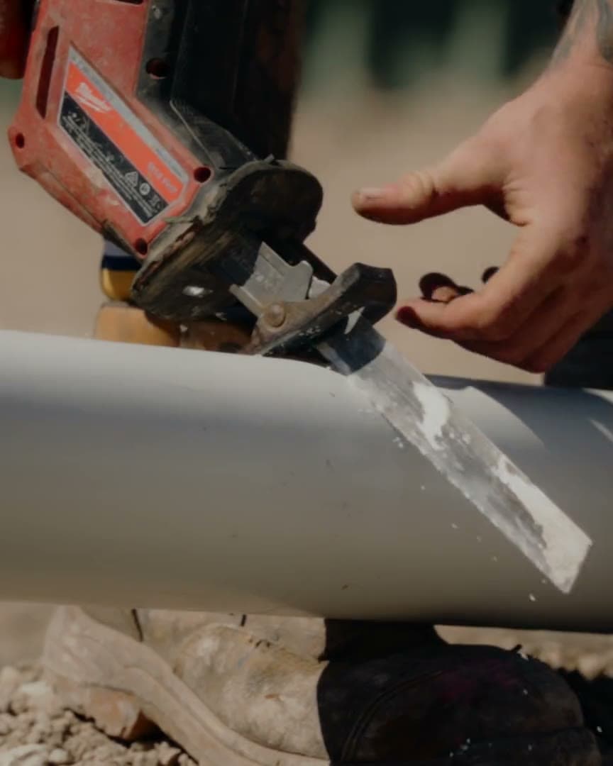 Zimco Plumbing cutting, priming and joining PVC drainage pipe